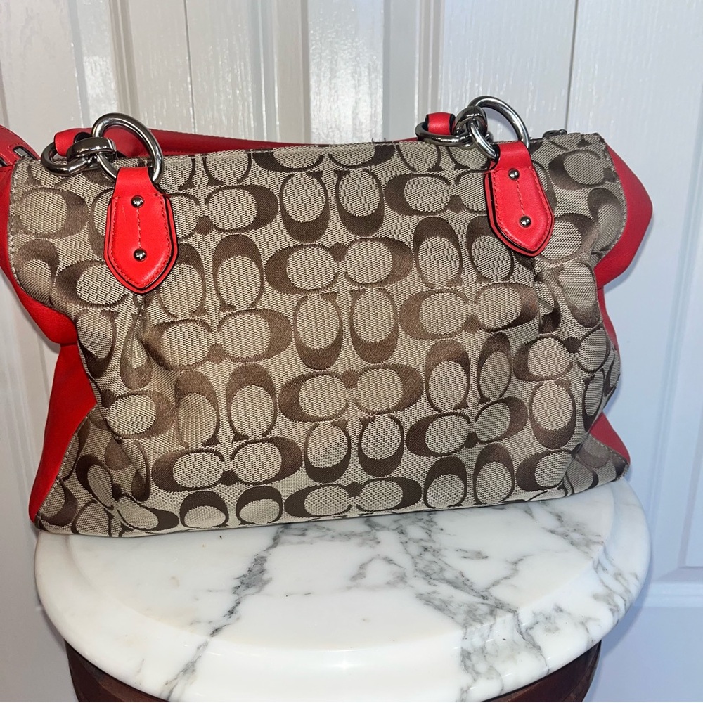 Coach Signature C
Beige Canvas w/ Orange Leather Trim Satchel Carryall Tote - Picture 3 of 12